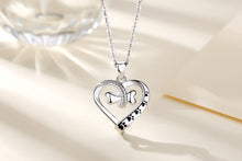 Load image into Gallery viewer, Bone in Heart and Black Pawprint Pendant and Necklace