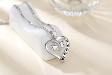 Load image into Gallery viewer, Bone in Heart and Black Pawprint Pendant and Necklace