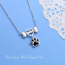 Load image into Gallery viewer, Bone and Black Paw Print Pendant and Necklace
